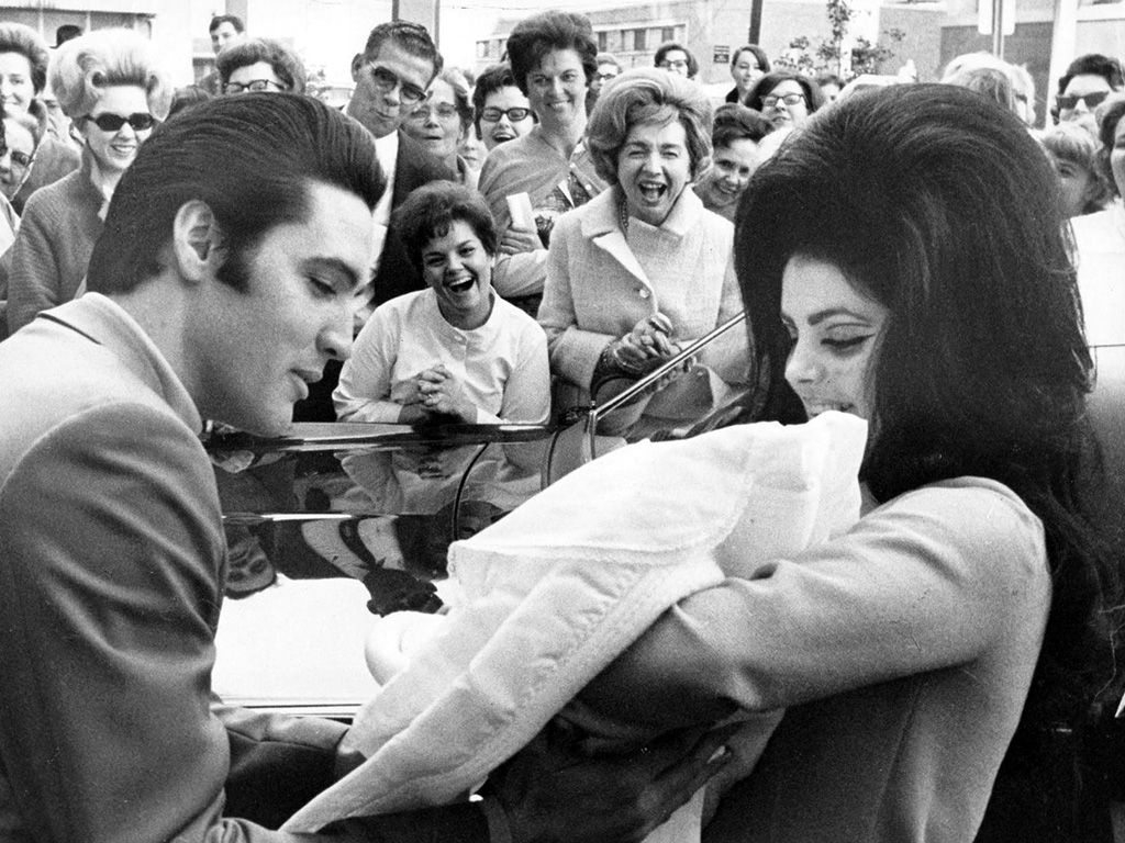 Priscilla Presley and Elvis Presley announcing the birth of their daughter Lisa Marie.