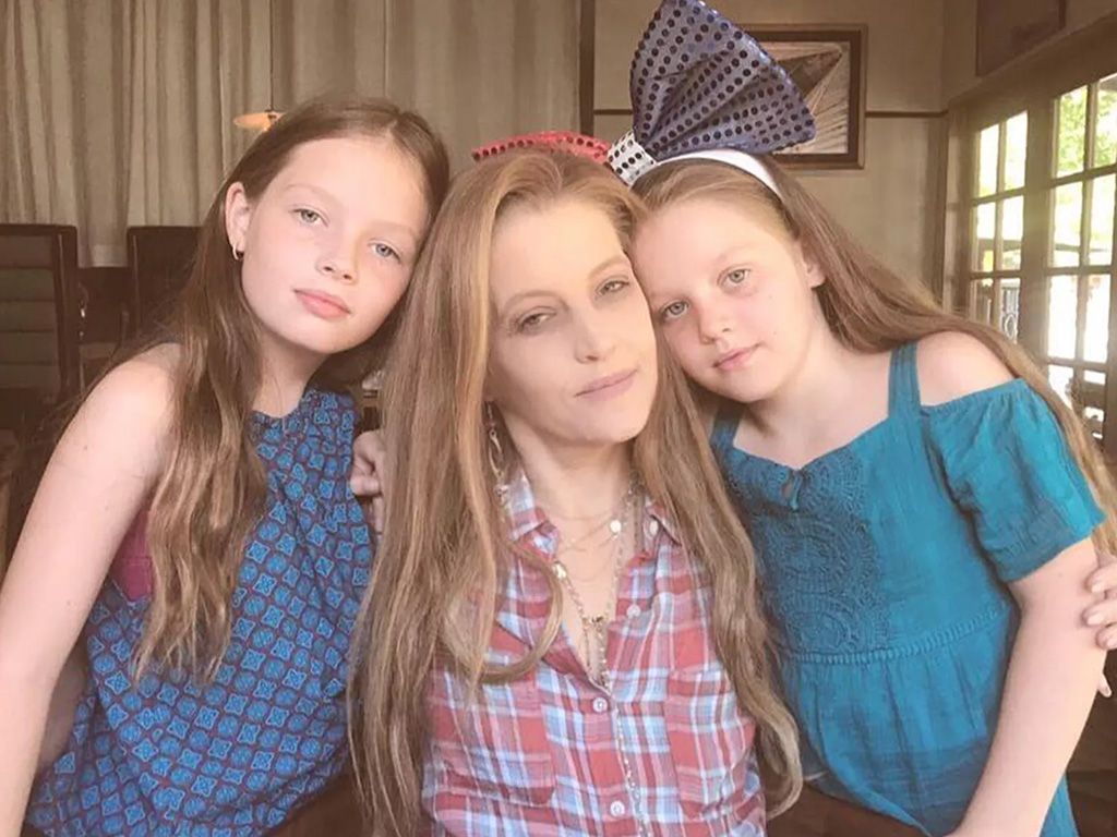Lisa Marie Presley and her twin daughters Finley and Harper.