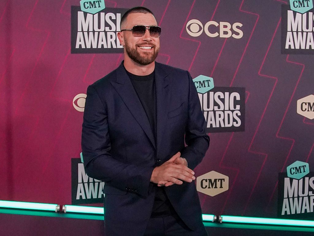 Travis Kelce on the red carpet for the CMT Music Awards